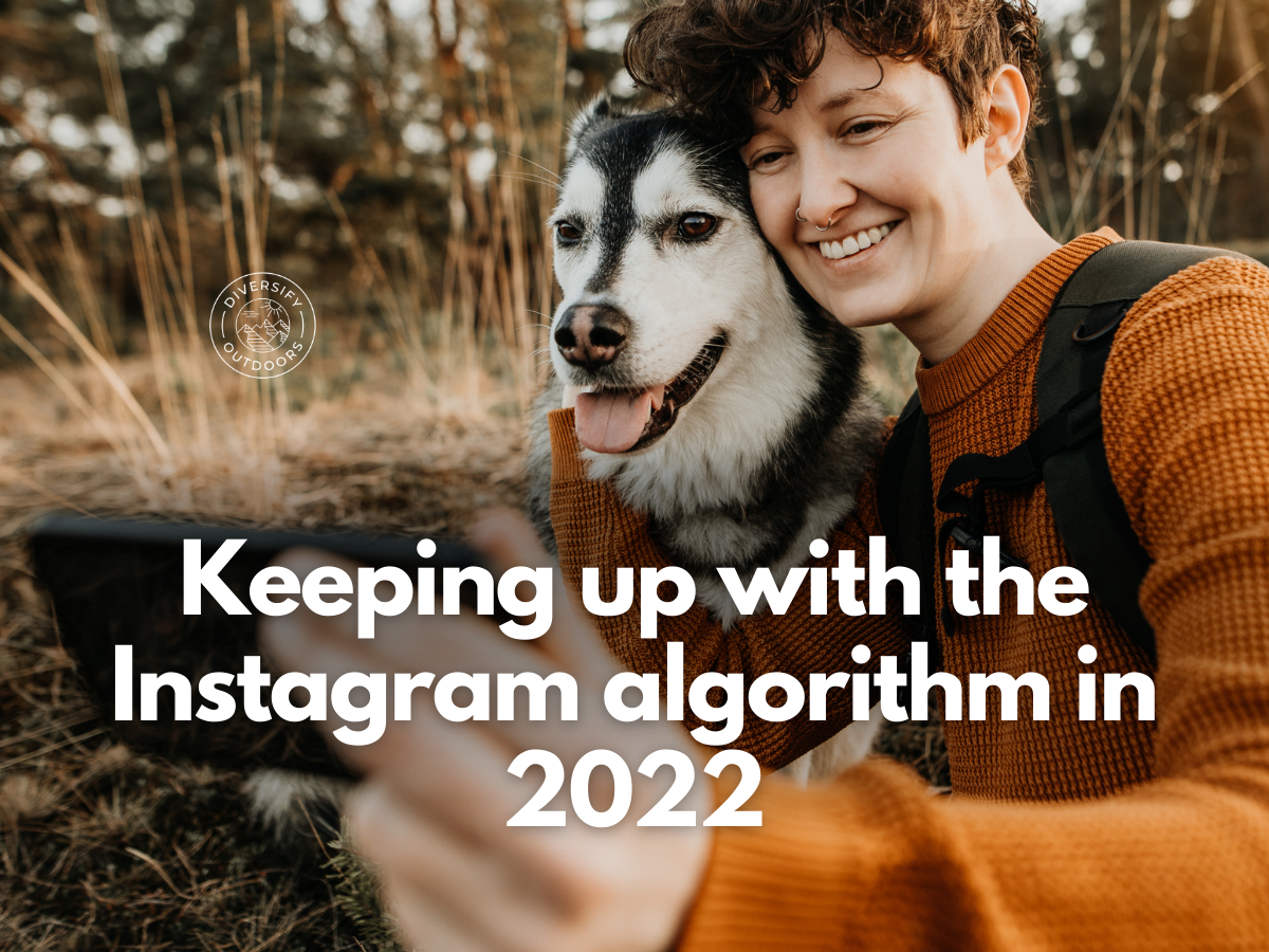 Banner Keeping Up with Instagram Algorithm White femme with dog looks at mobile phone held in left hand